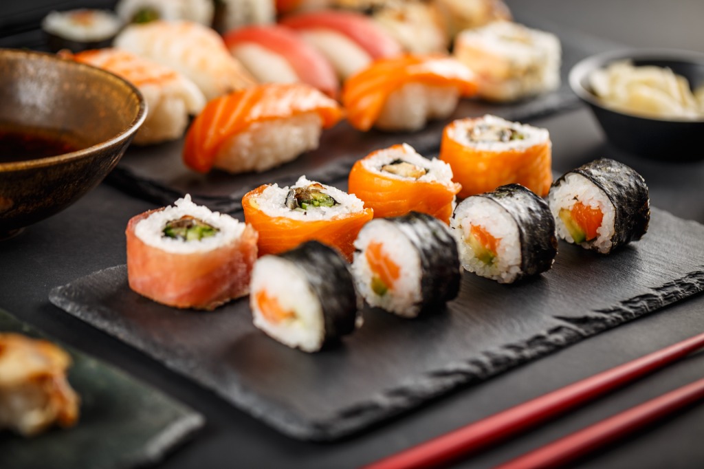 Full sushi platter on black stone
